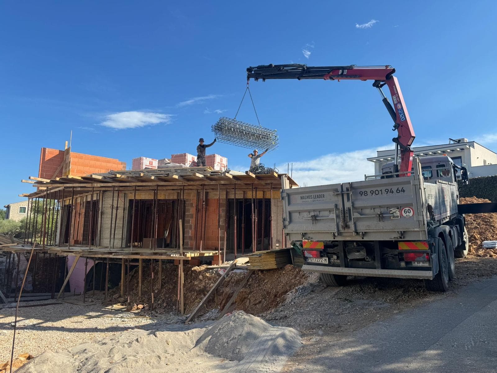 Building material delivery to the construction site